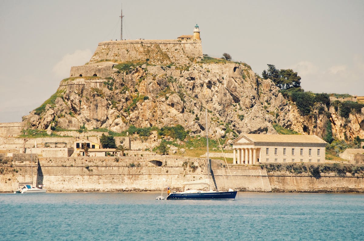 Old Fortress in Corfu with a sailing boat