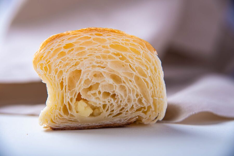 Cross-section of a flaky croissant showing laminated layers