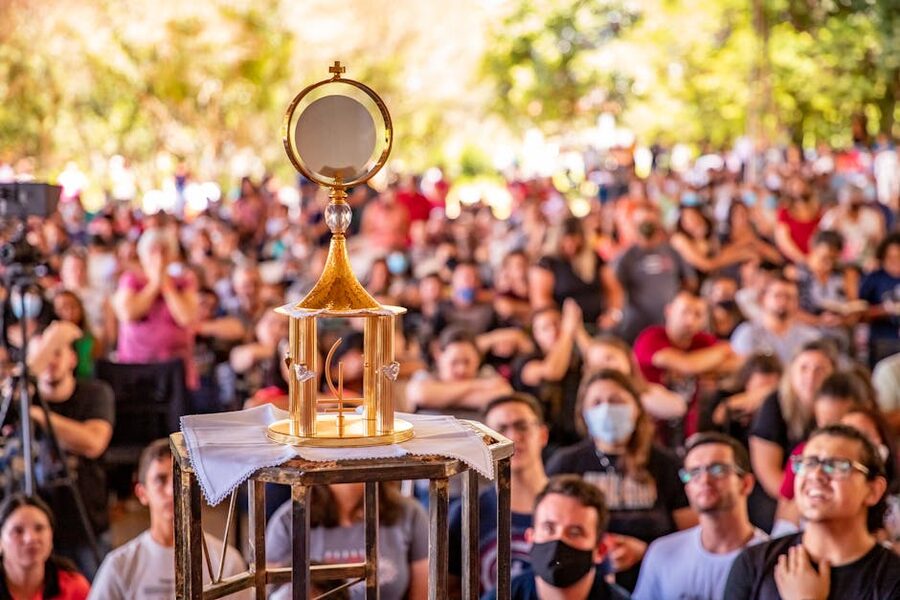 Large crowd at outdoor religious celebration