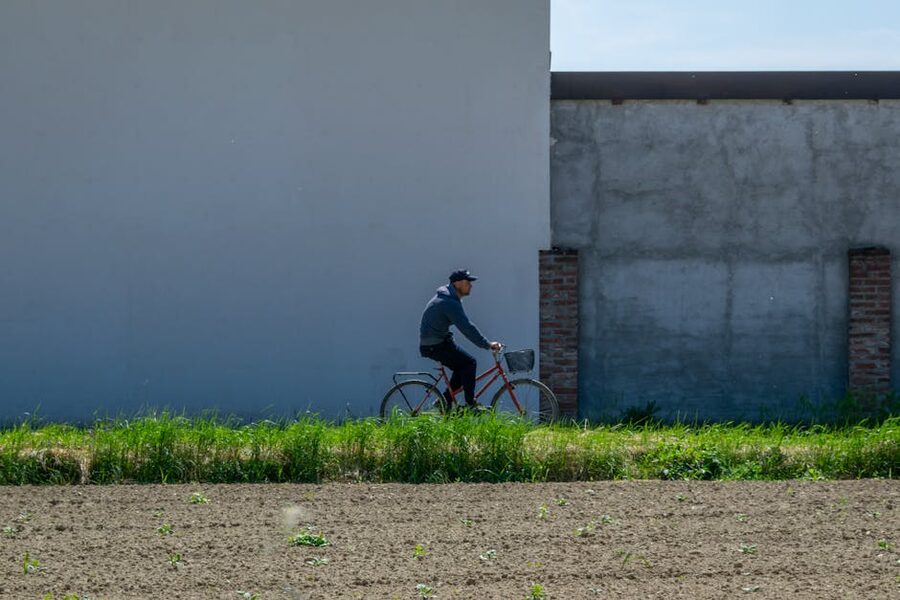 Cyclist in rural Italian countryside