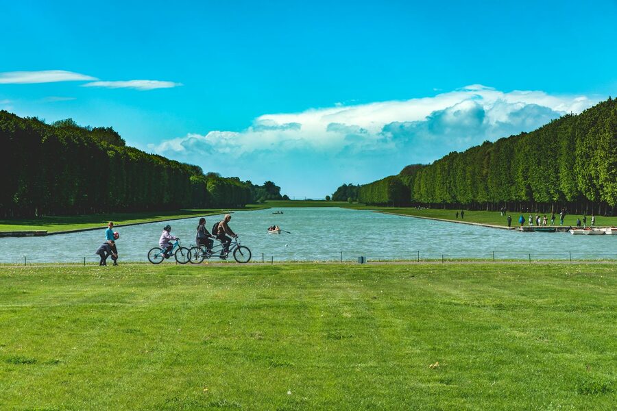 Cyclists and walkers along the Grand Canal at Versailles