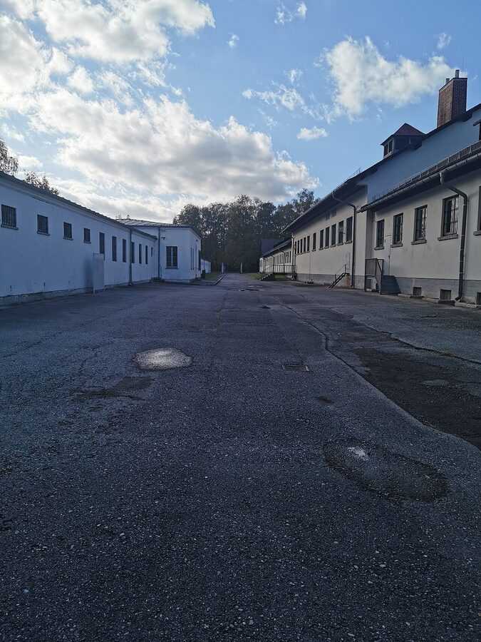 Visitor pathway through Dachau memorial grounds