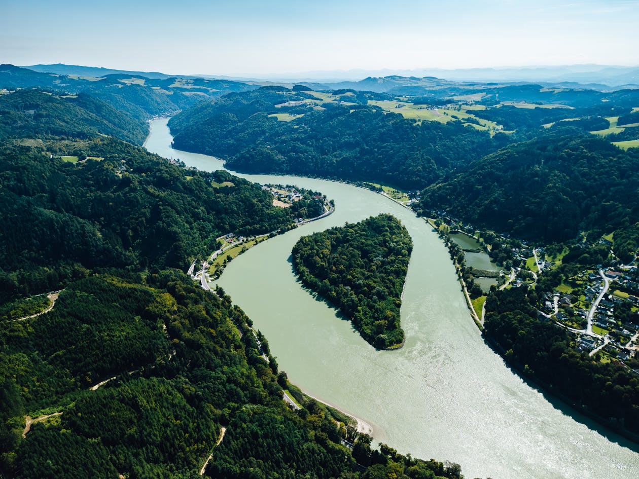 Scenic aerial view of the Danube River winding through lush landscapes