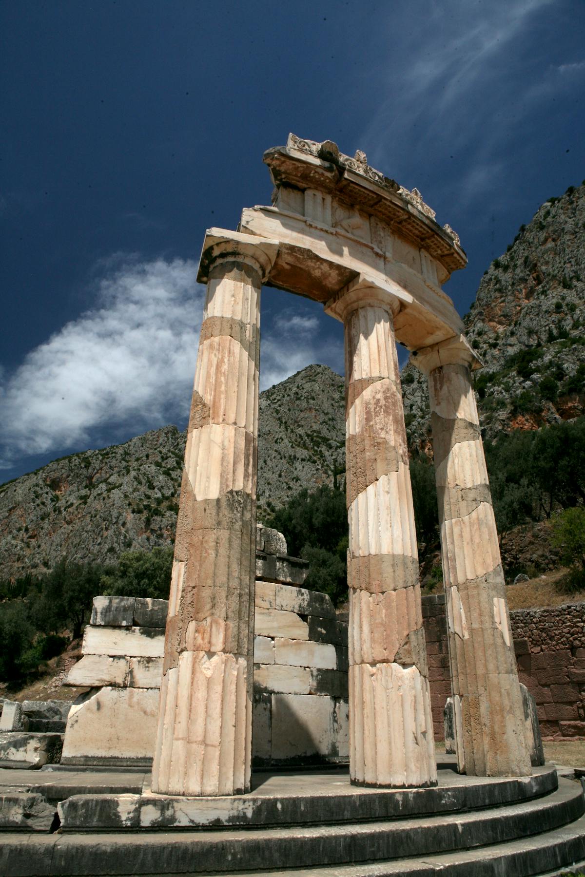 Ancient Greek stone ruins under a sunny sky