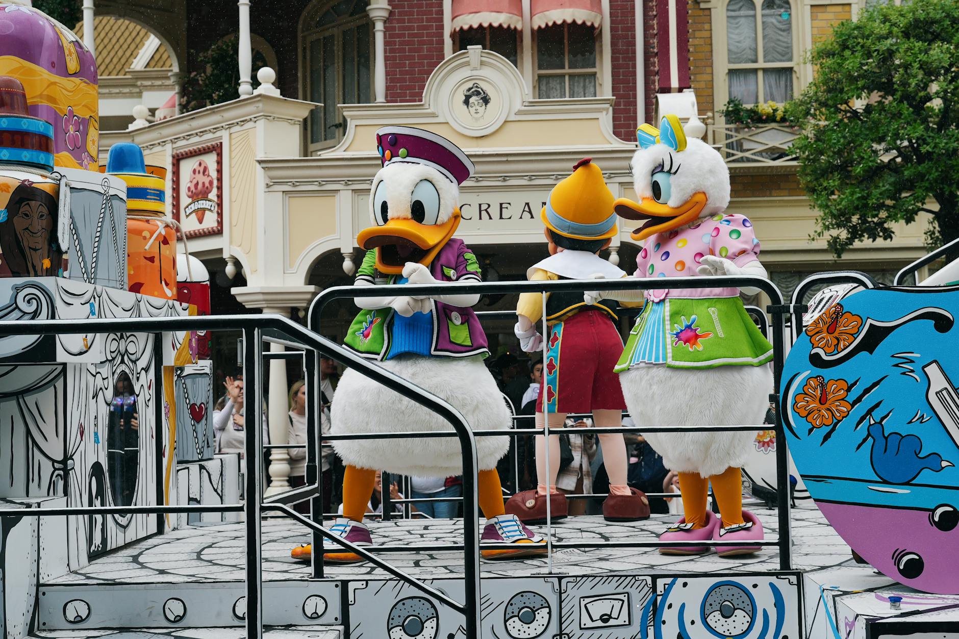 Disney characters performing in a parade at Disneyland Paris