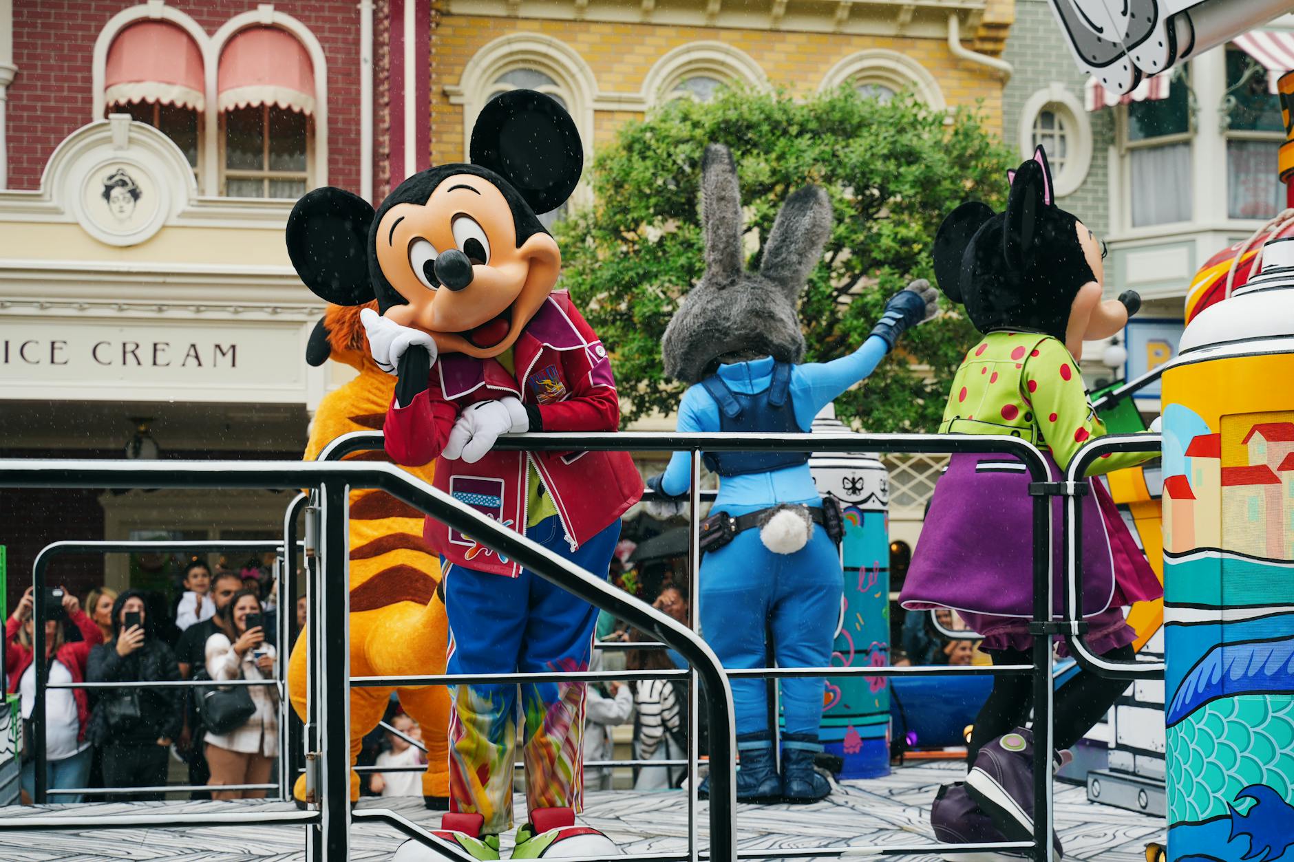 Disney mascot characters performing in a parade