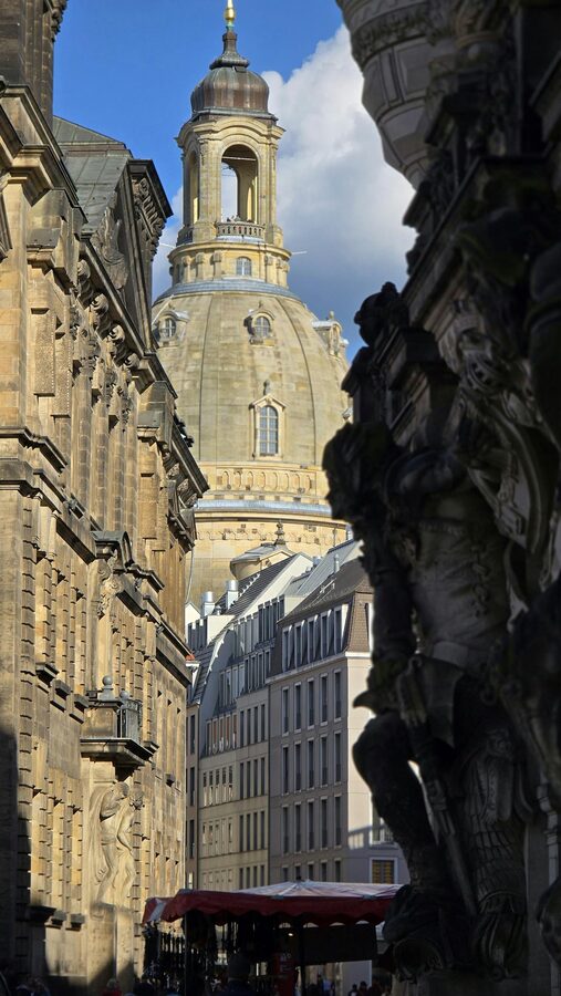 Dresden Frauenkirche framed by historic buildings