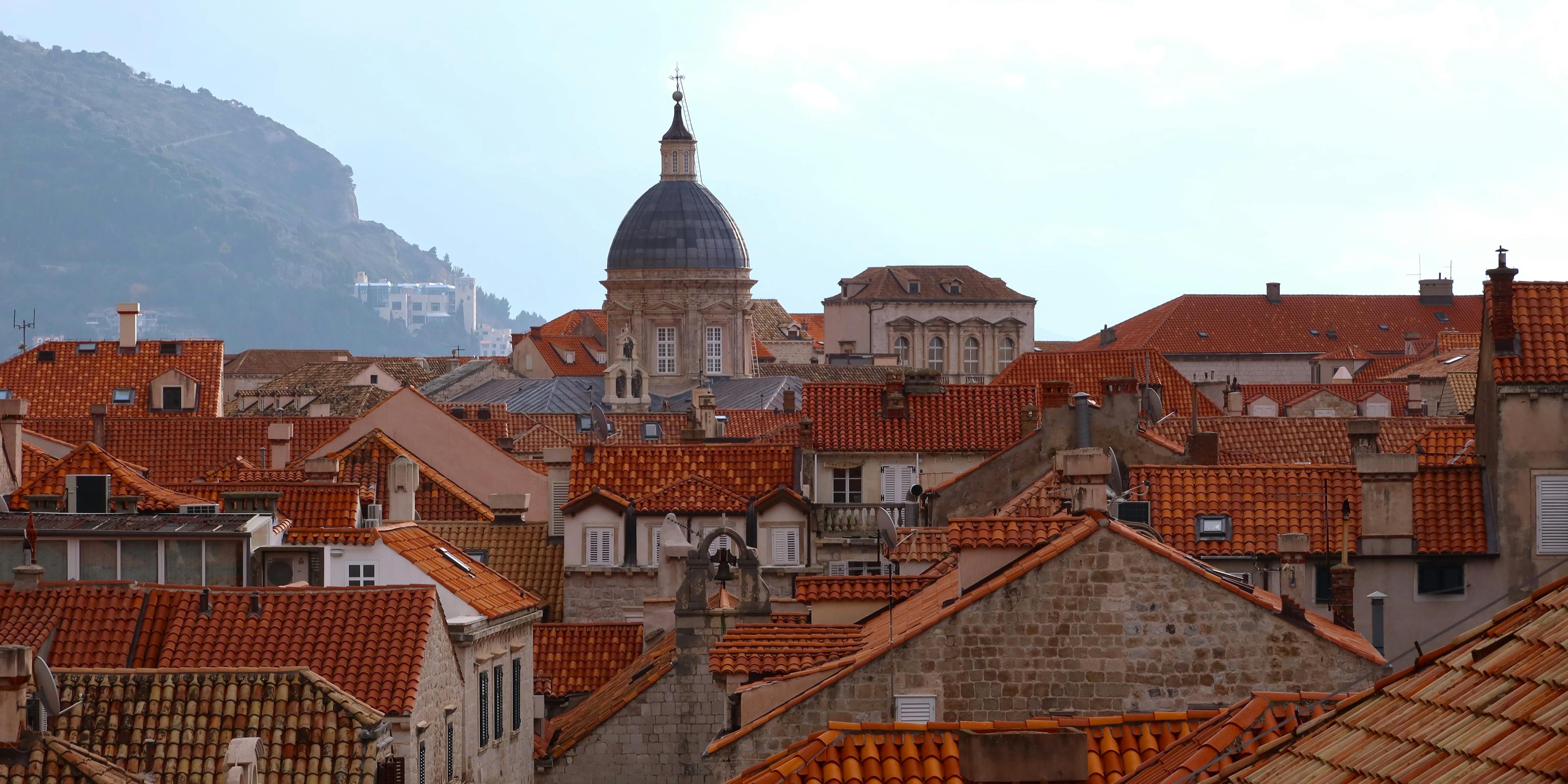 Explore the historic red rooftops of Dubrovnik's Old Town, featuring iconic architecture