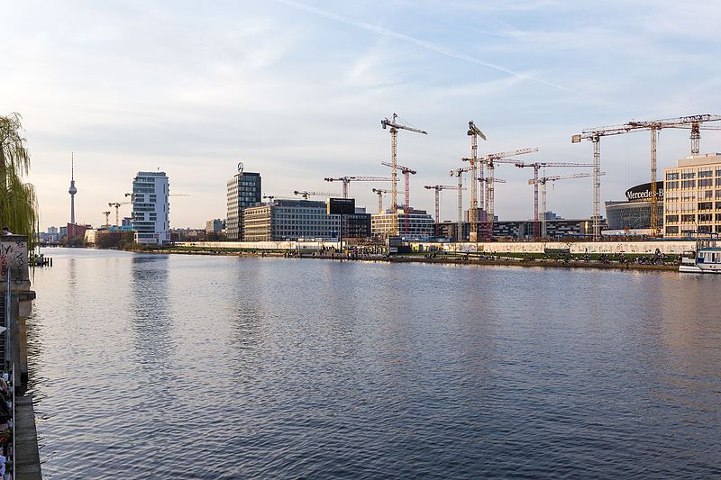 View of East Side Gallery from across the Spree River Berlin