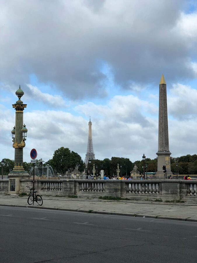 Eiffel Tower and Obelisk at Place de la Concorde on a cloudy day