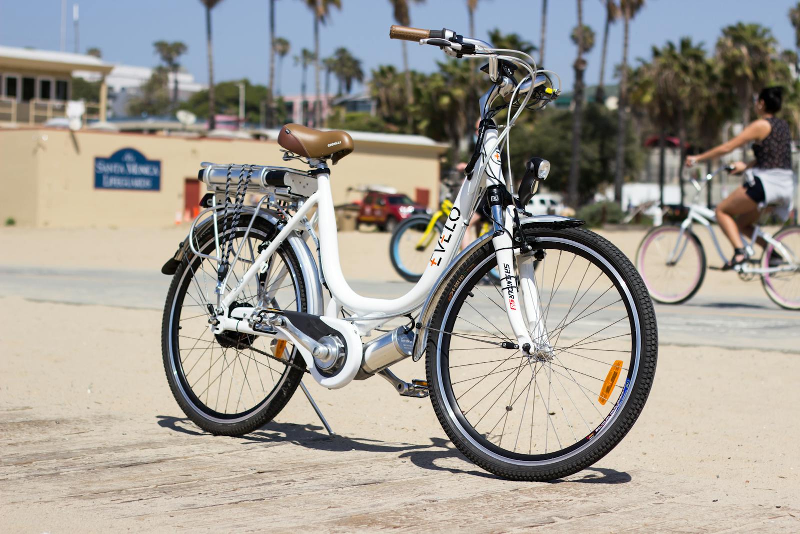 An electric bicycle parked on a sunny path ready for a city tour