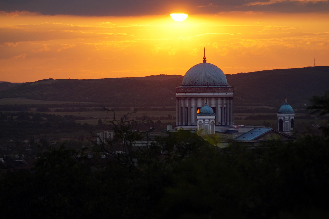 Esztergom Basilica silhouetted against sunset over the Danube