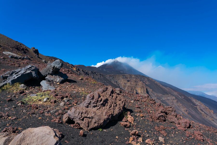 Etna volcanic terrain with sea of clouds