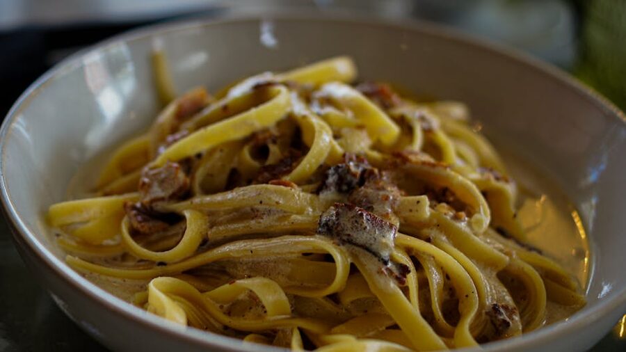 Creamy fettuccine carbonara with guanciale