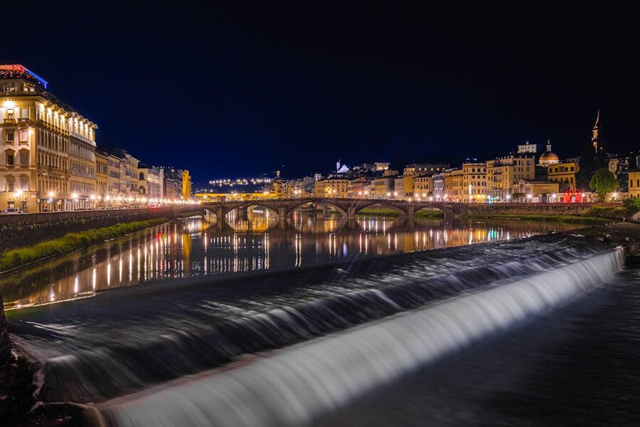Florence Arno River at night illuminated