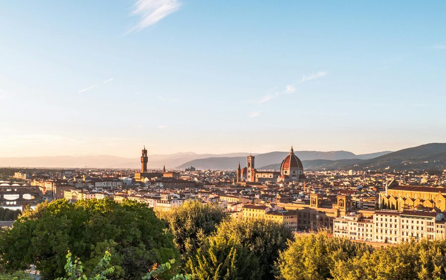 Florence skyline with Duomo and Arno River at sunset