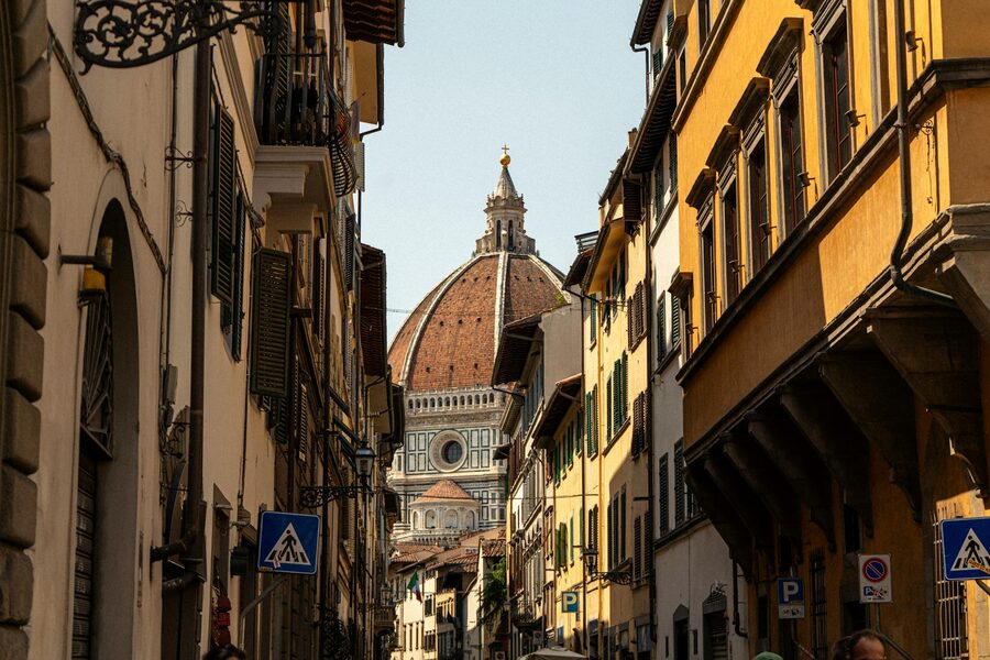 Florence street with view of cathedral dome