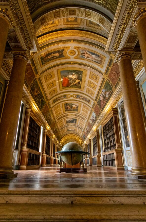 Ornate hallway in Chateau de Fontainebleau with classical architecture