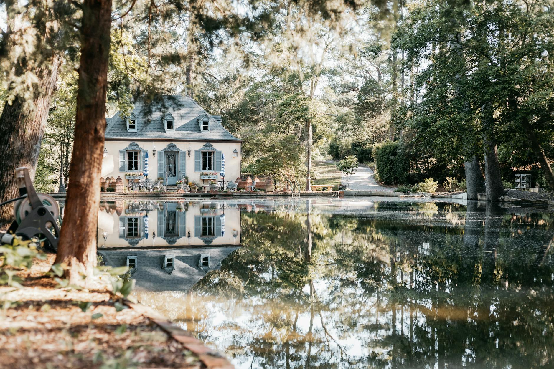 French cottage with reflection pool and garden