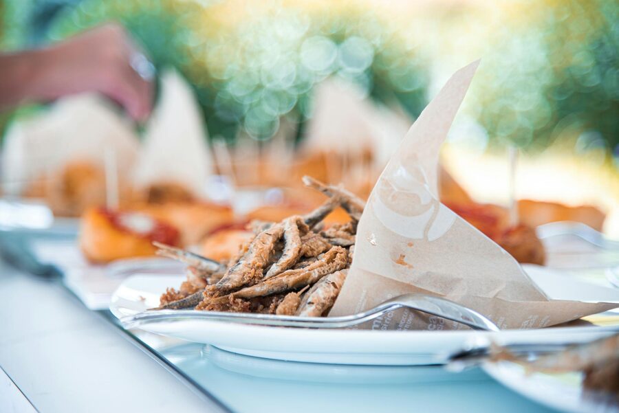 Fried food platter at an outdoor dining setting