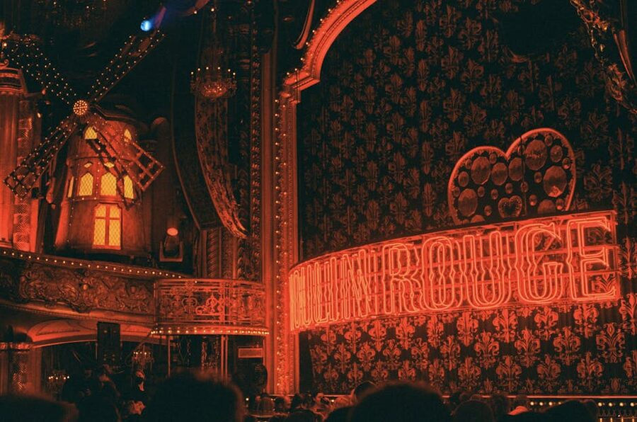 Neon-lit theater interior