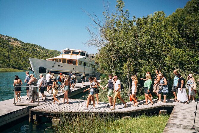 From Split: Krka Waterfalls, Food & Wine Tasting Tour - Krka National Park: waterfalls, walkways, and the cash entry fee
