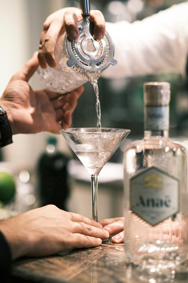 Gin being poured into a martini glass in Paris