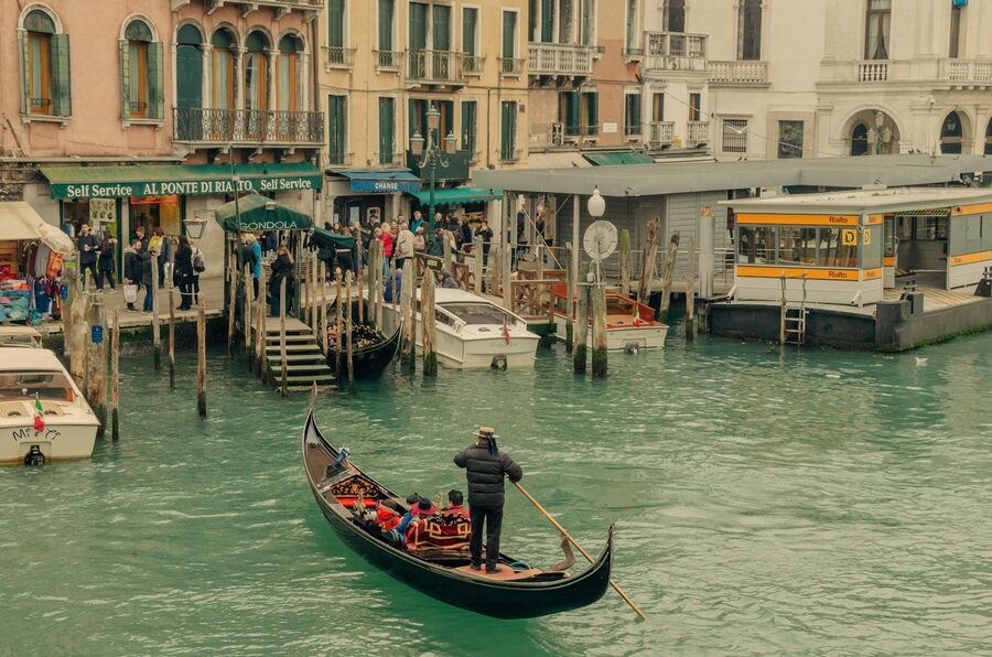 Gondolier in a Venice canal near Rialto