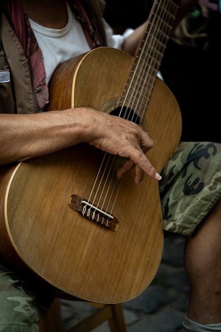 Close-up of guitar strings on an acoustic guitar