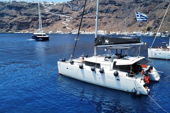 Half Day Premium Catamaran Cruise in Santorini including Oia - Santorini Volcano and Hot Springs: Warm Water, Limited Window
