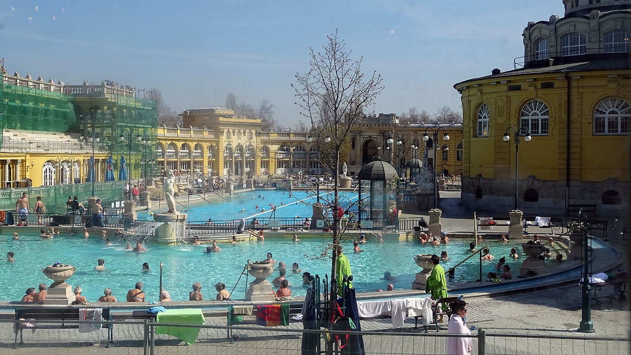 Bathers enjoying the warm thermal pools at Széchenyi Bath Budapest
