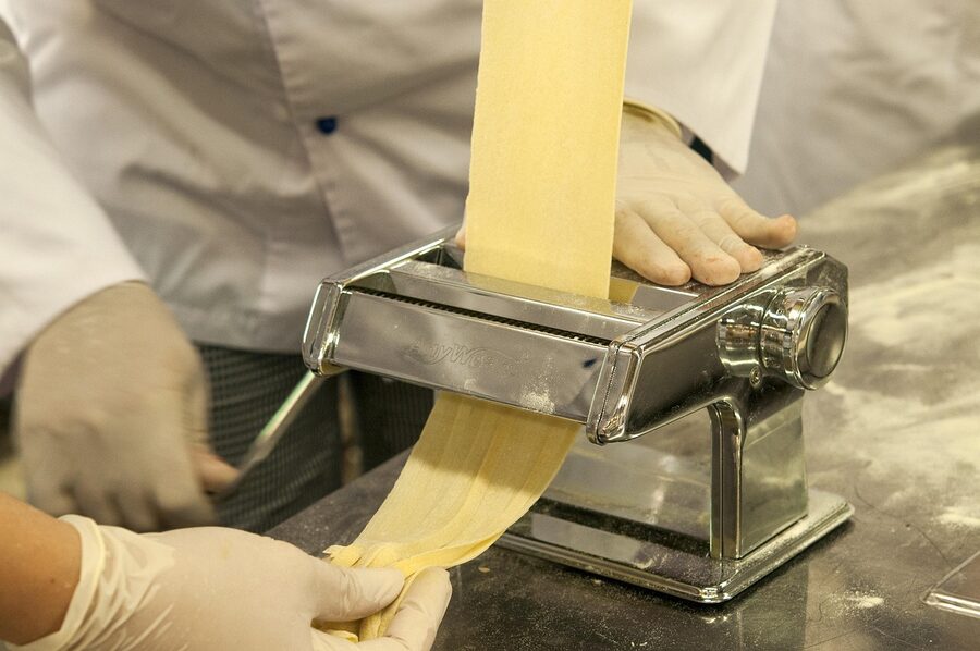 Italian pasta making with chef and fresh ingredients