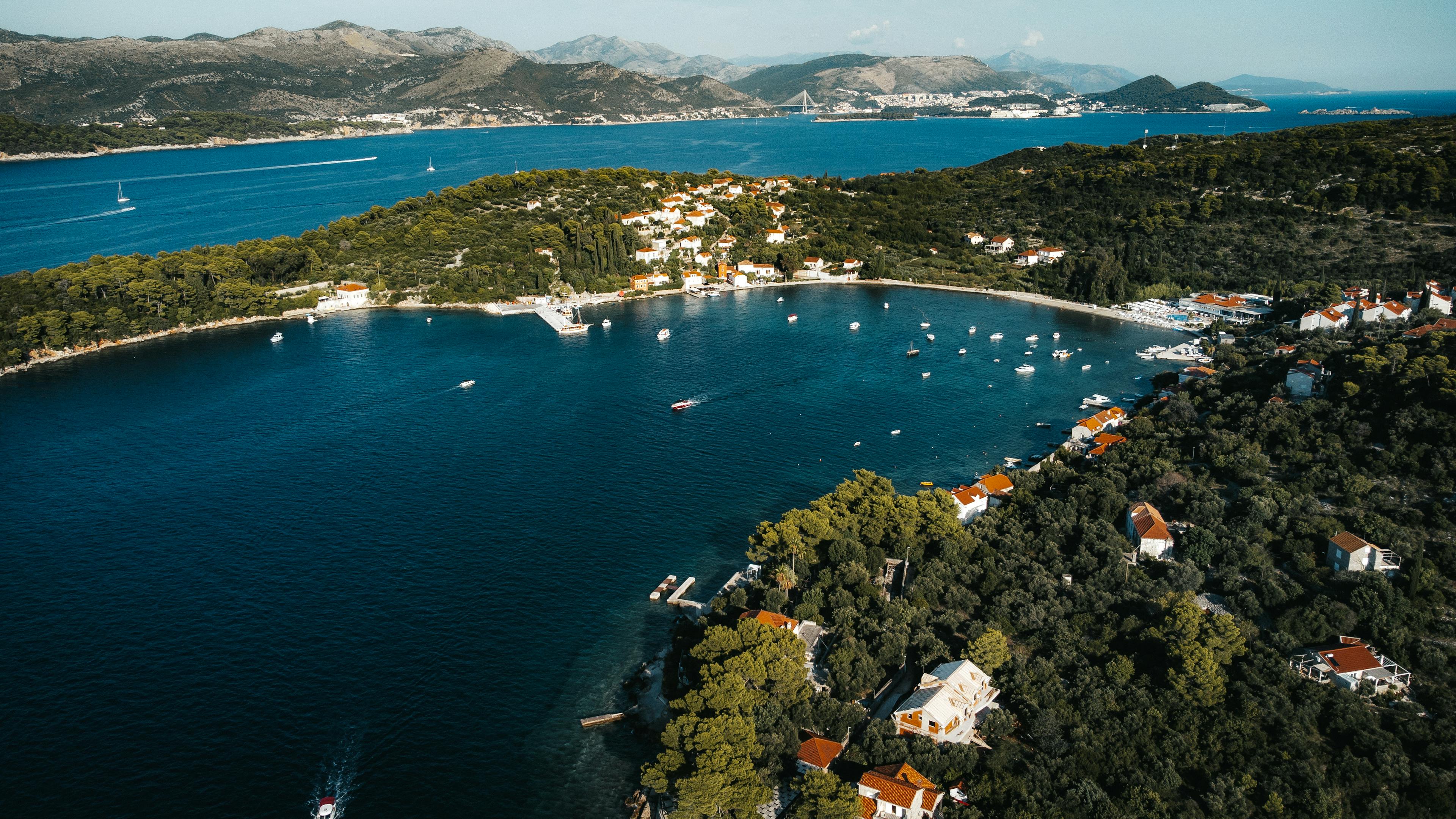 A stunning aerial shot of Kolocep Island, Croatia, showcasing the azure waters and lush landscape