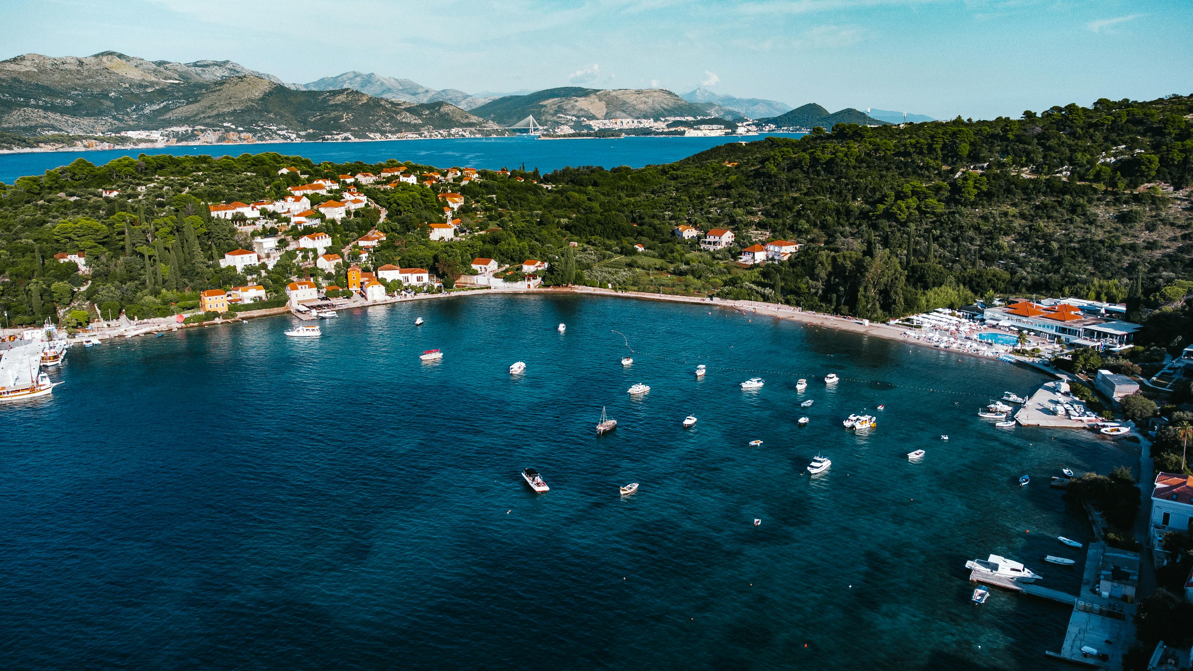 A stunning aerial view of Kolocep Island's coastline and blue sea in Croatia