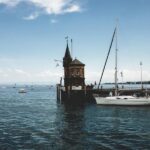 Sailboats and harbor tower in Konstanz