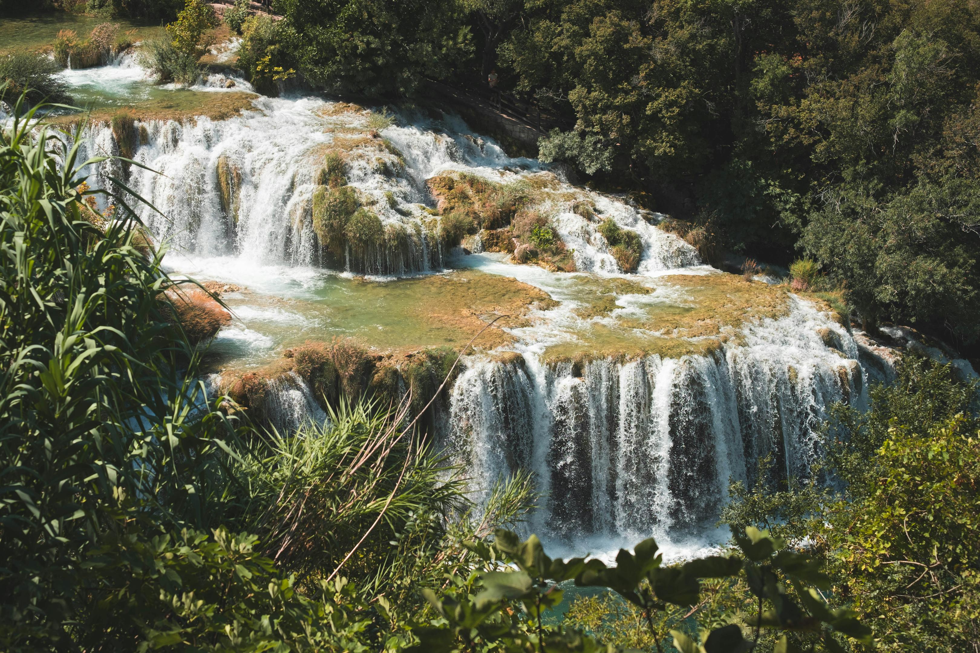 Beautiful cascading waterfall amidst lush greenery at Krka in Croatia