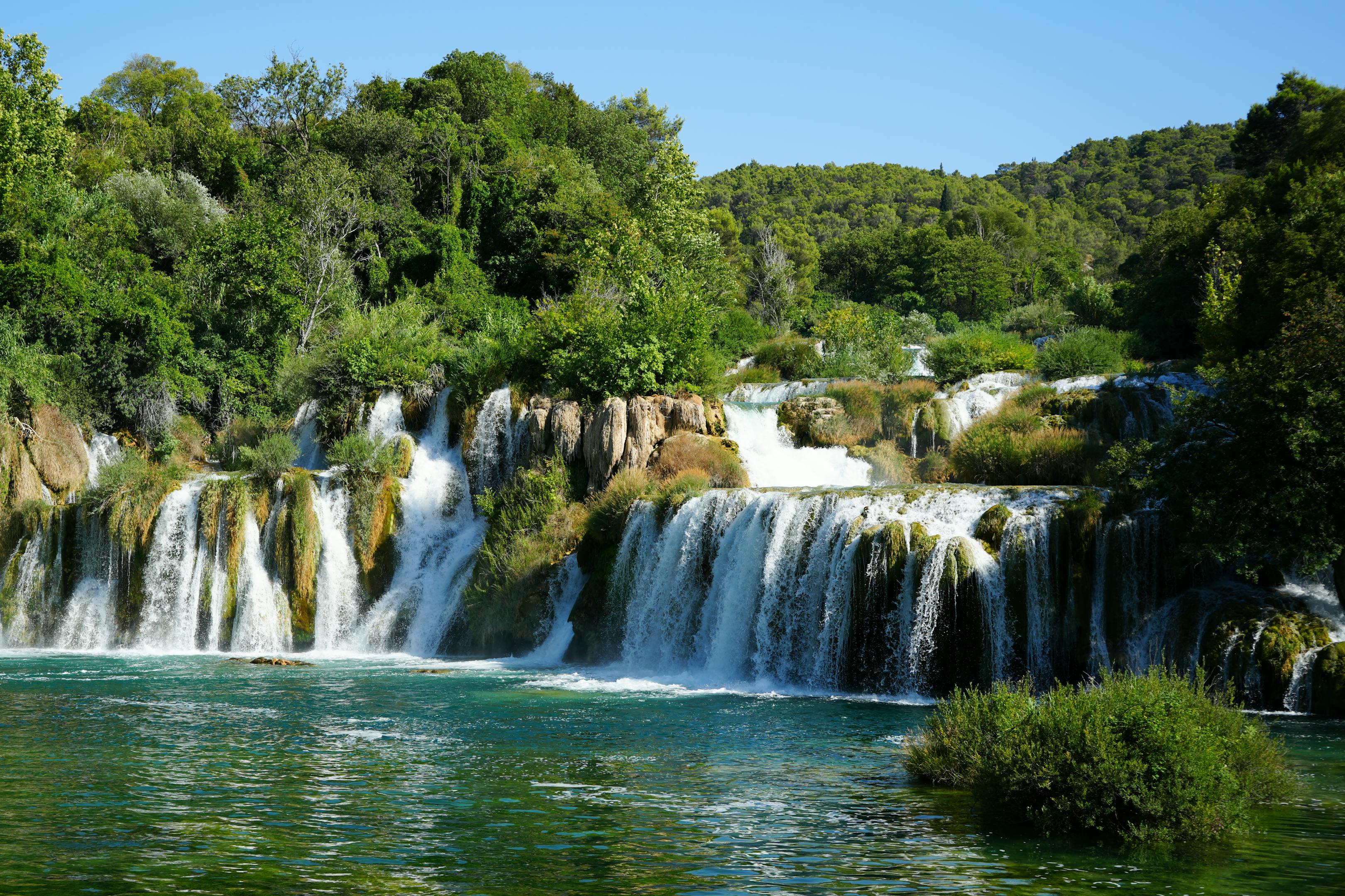 Beautiful cascading waterfalls in lush Krka National Park, Croatia, during summer