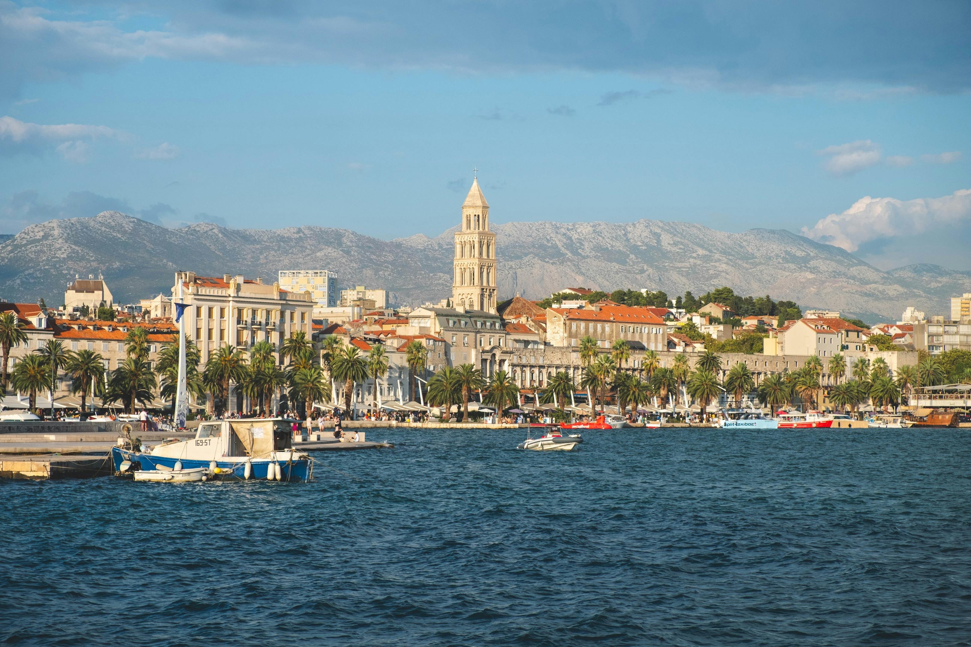 Stunning view of Split's old town and waterfront with mountains in the background