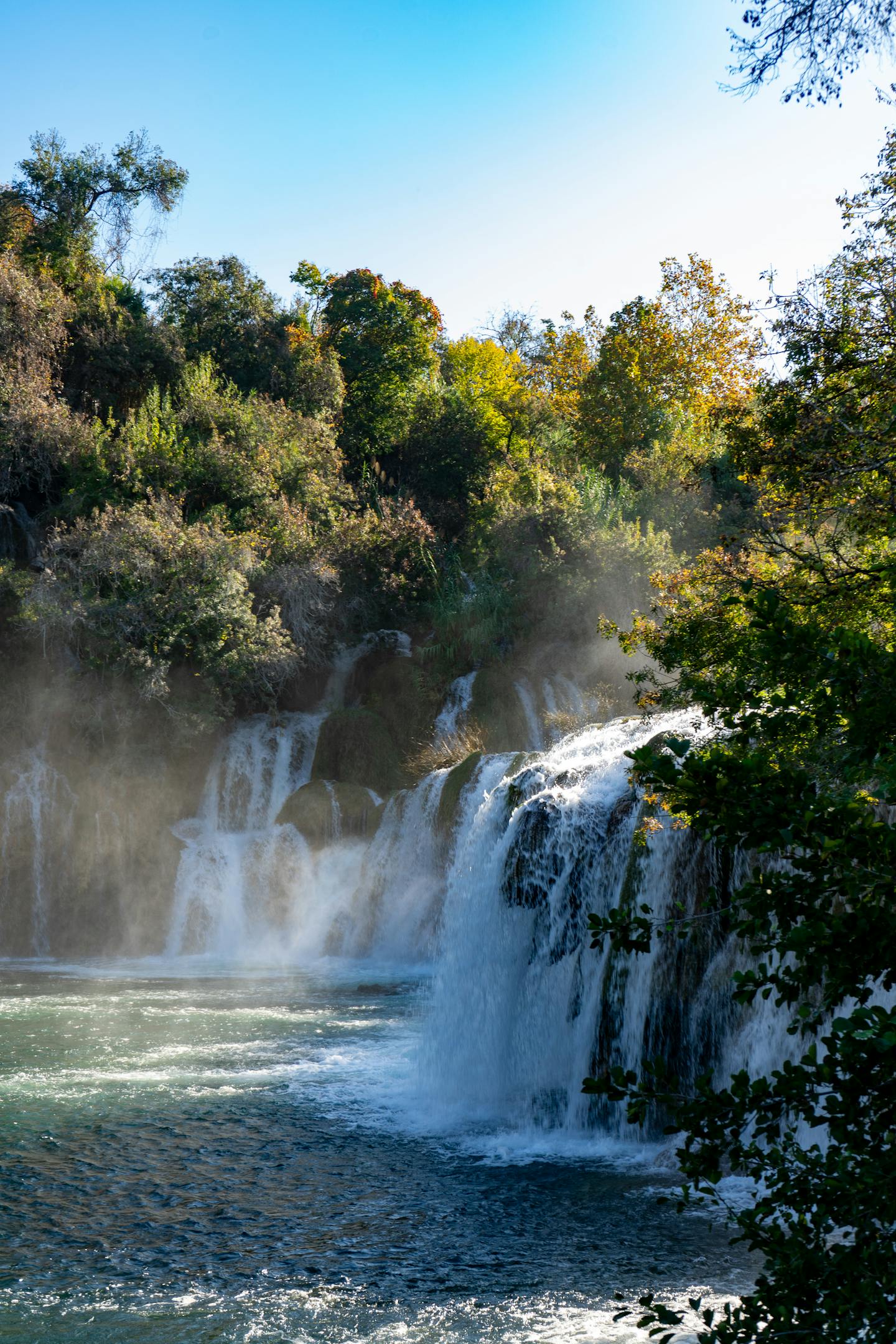 Beautiful waterfalls cascading through lush greenery in Krka National Park