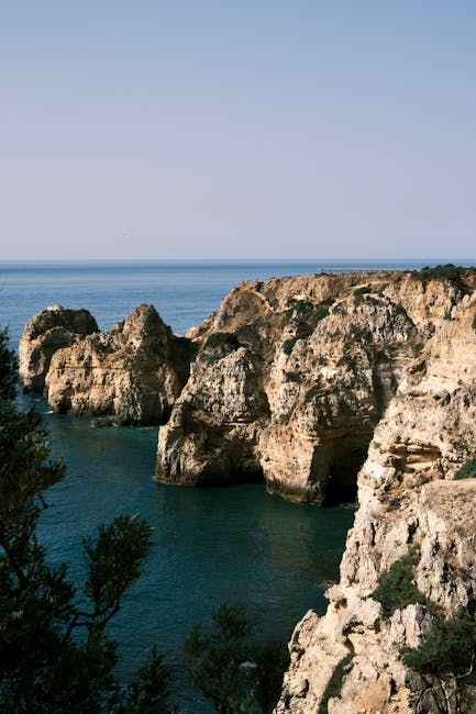 Boat entering sea grottos near Lagos