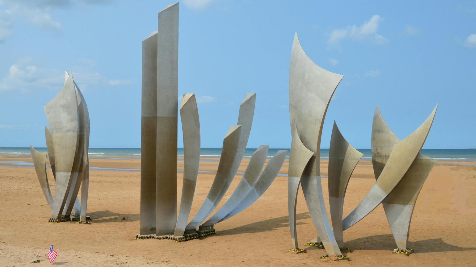 Le Brave monument on Omaha Beach at Colleville-sur-Mer at sunset