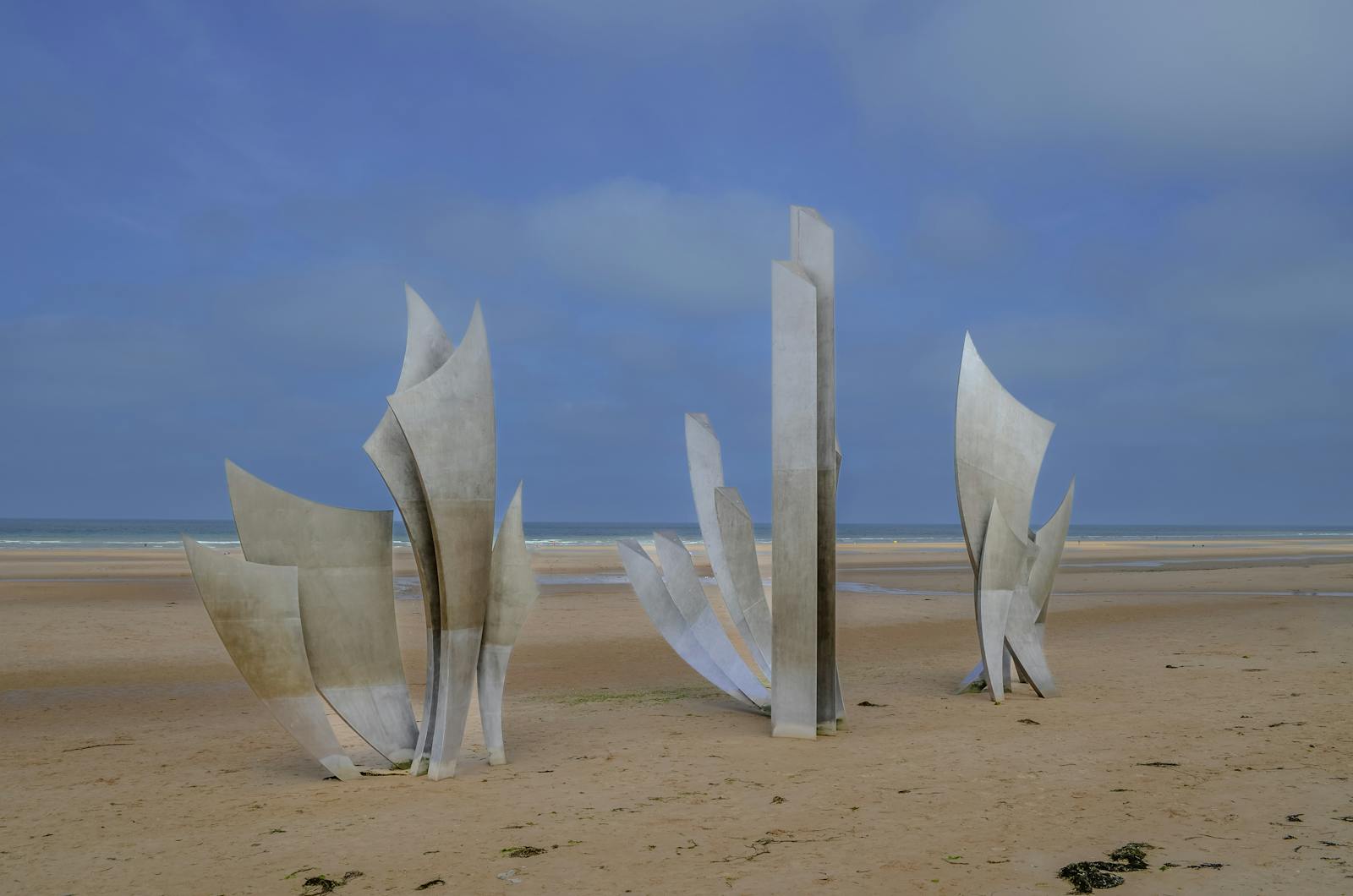 Le Monument des Braves sculpture on Omaha Beach honoring D-Day history