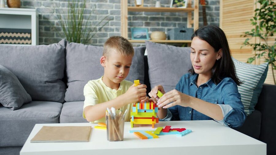 Mother and son building with LEGO