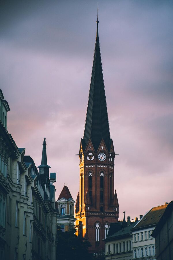 Gothic clock tower of a historic church in Leipzig