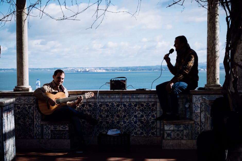 Fado musician playing guitar in a Lisbon venue