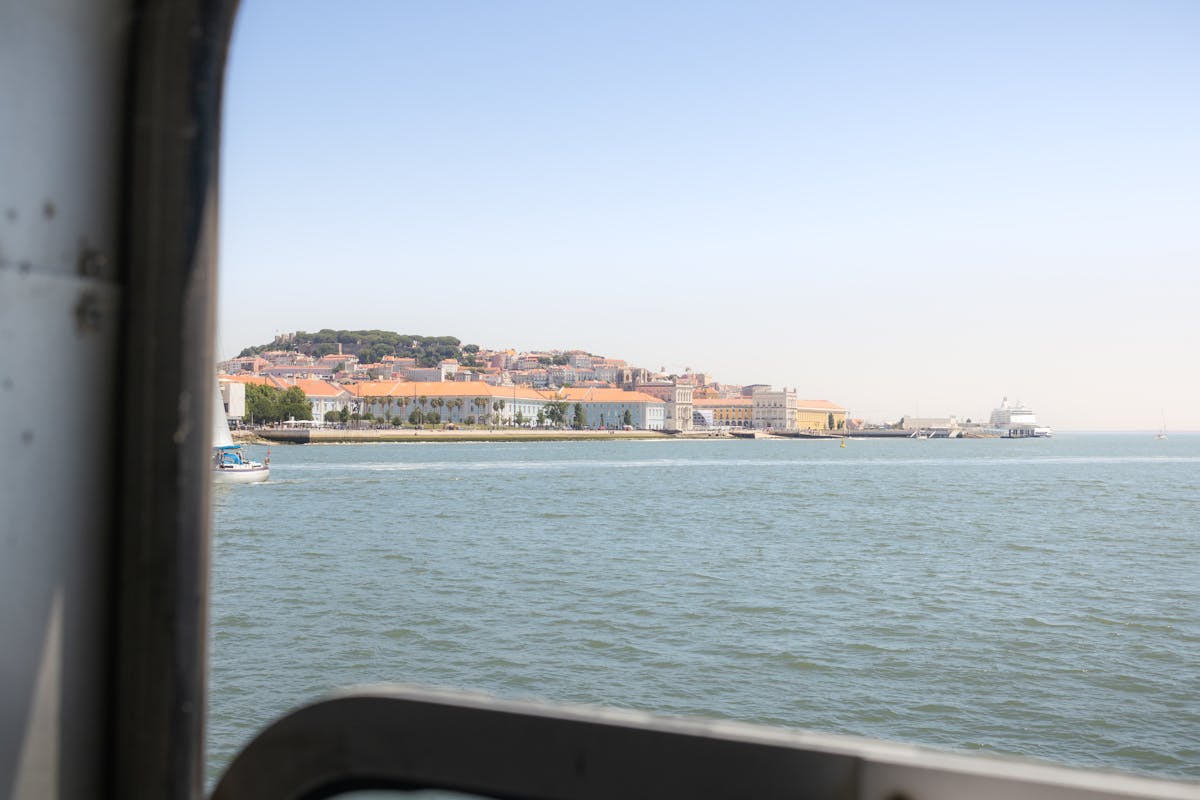 View of Lisbon waterfront from a ferry on the Tagus River