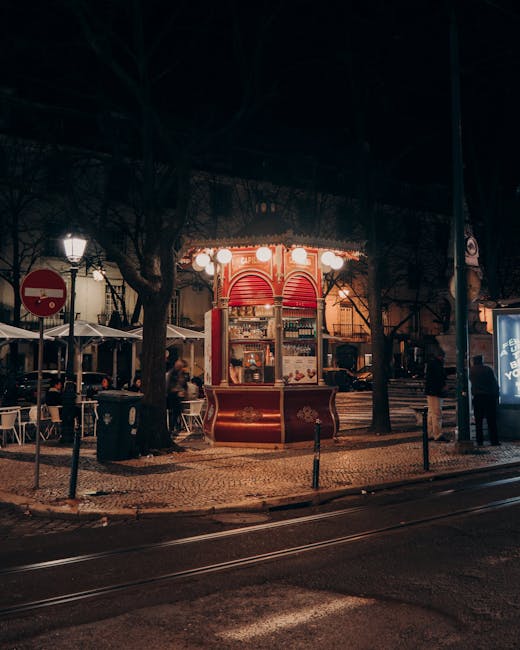 Lisbon tram on a street at night