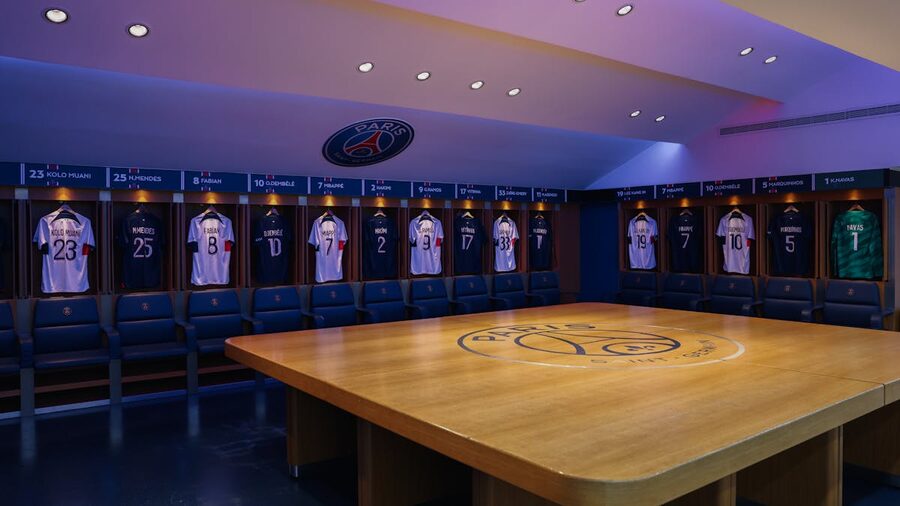 Sports stadium locker room with benches