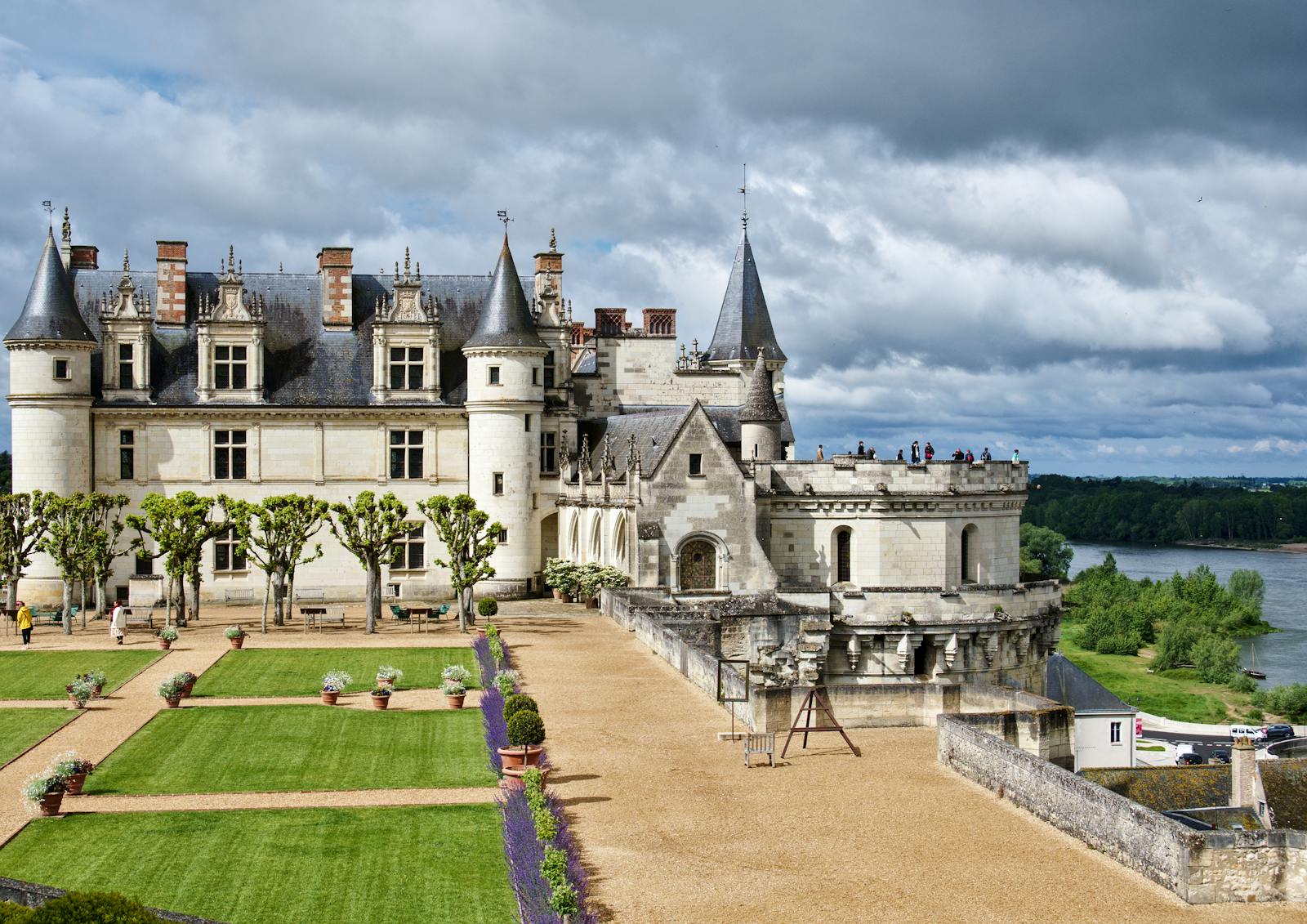 Chateau Royal d Amboise with its gardens under a cloudy sky in France