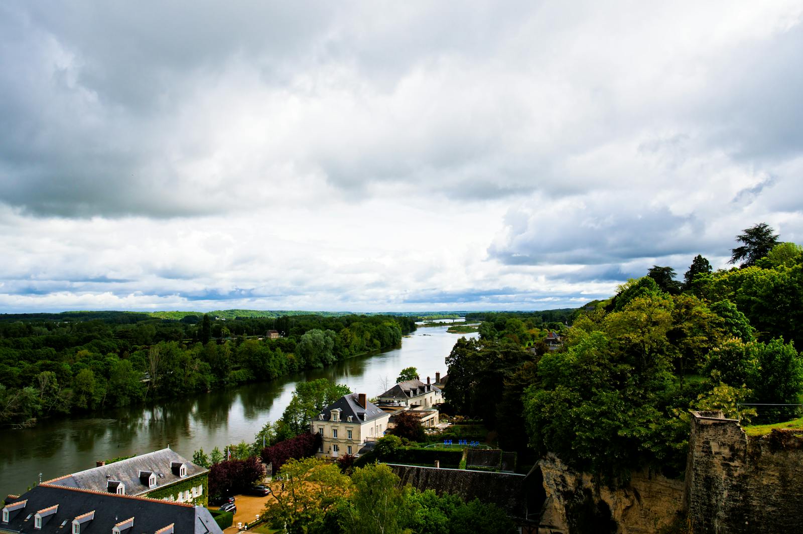 Serene view of the Loire River near Amboise with lush greenery in France